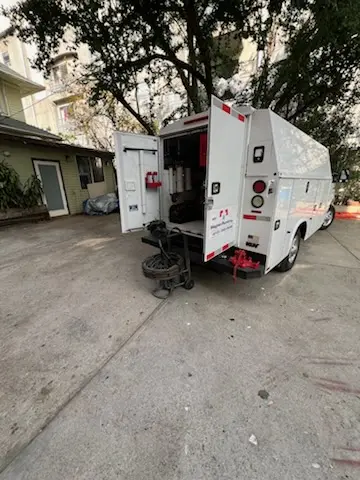 Magnet Plumbing service vehicle on-site for Grease Trap Cleaning in Topanga